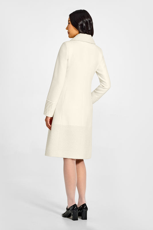 Sentaler A-line Ivory Coat with Bouclé Alpaca Collar and Trim in Baby Alpaca wool. Seen from back on female model.