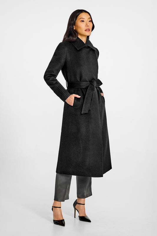 Sentaler Long Lapel Collar Wrap Black Coat in Baby Alpaca wool. Seen from side on female model.
