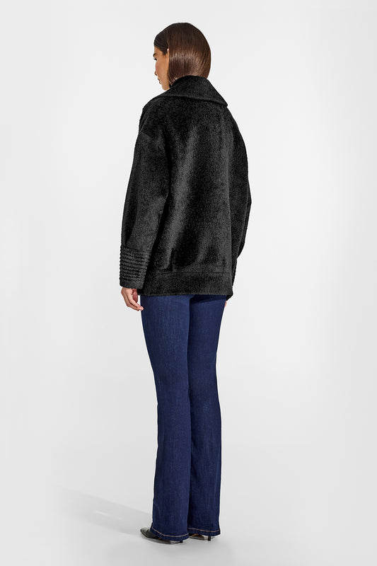 Sentaler Bouclé Alpaca Aviator Black Jacket in Bouclé Alpaca wool. Seen from back on female model.