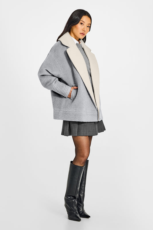 Sentaler Bouclé Alpaca Aviator Glacial Grey Jacket in Bouclé Alpaca wool. Seen from side open on female model.