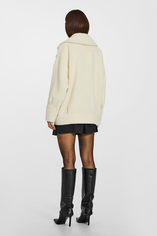 Sentaler Bouclé Alpaca Aviator Ivory Jacket in Bouclé Alpaca wool. Seen from back on female model.