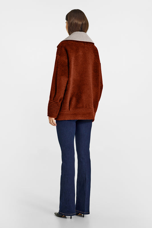 Sentaler Bouclé Alpaca Aviator Rust Jacket in Bouclé Alpaca wool. Seen from back on female model.