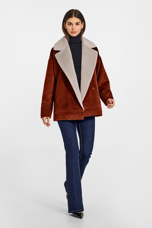 Sentaler Bouclé Alpaca Aviator Rust Jacket in Bouclé Alpaca wool. Seen from front open on female model.