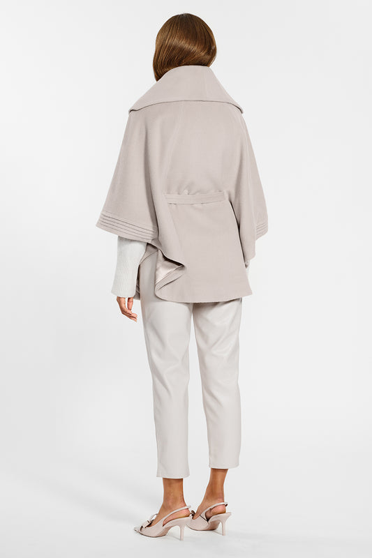 Sentaler Cape with Shawl Collar and Belt crafted in Baby Alpaca wool and in Bleeker Beige. Seen from back on female model.