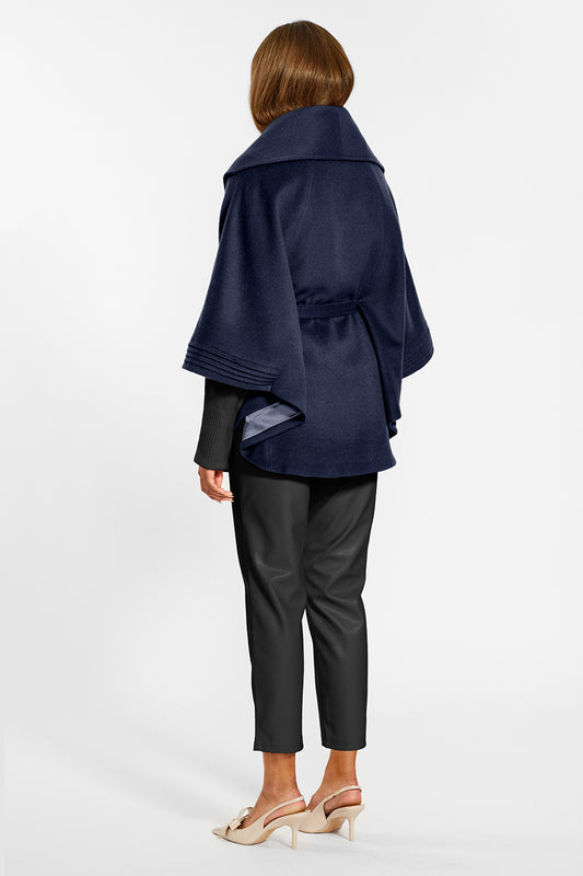 Sentaler Cape with Shawl Collar and Belt crafted in Baby Alpaca wool and in Deep Navy Blue. Seen from back on female model belted.
