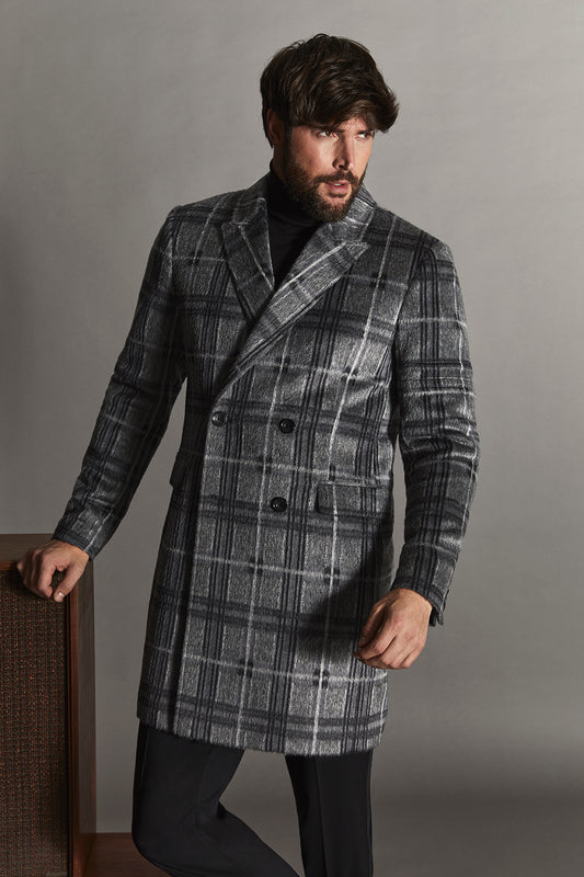 Sentaler Suri Alpaca Double Breasted Grey Check Overcoat in Technical Suri Alpaca wool. Seen from front above the knees on male model.