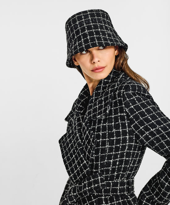 Sentaler Tweed Black Check Bucket Hat in Tweed Suri Alpaca wool. Seen from side close up on female model.