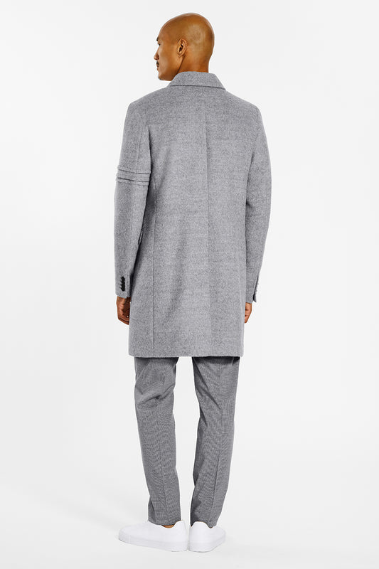 Sentaler Baby Alpaca Double Breasted Shale Grey Overcoat in Technical Baby Alpaca wool. Seen from back on male model.