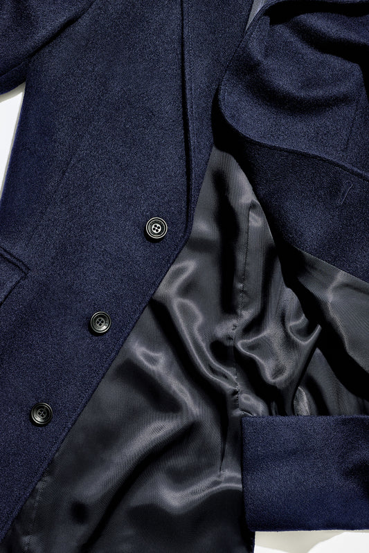 Sentaler Technical Baby Alpaca Notched Lapel Overcoat crafted in Technical Baby Alpaca and available in Deep Navy. Seen as fabric swatch close up.