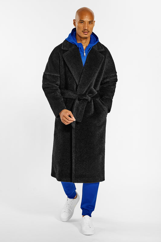 Sentaler Technical Bouclé Alpaca Robe Coat crafted in Technical Bouclé Alpaca and available in Black. Seen from front belted on male model.