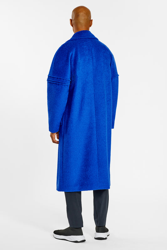 Sentaler Technical Bouclé Alpaca Robe Coat crafted in Technical Bouclé Alpaca and available in Cobalt Blue. Seen from back on male model.