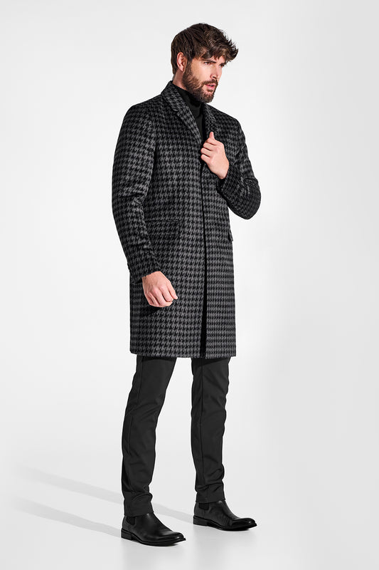 Sentaler Suri Alpaca Notched Lapel Black & Graphite Houndstooth Overcoat in Technical Suri Alpaca wool. Seen from side on male model.