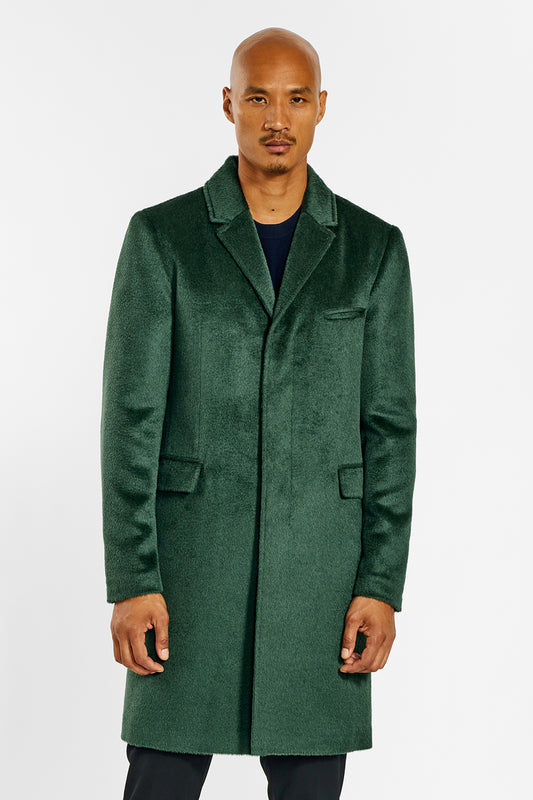 Sentaler Technical Suri Alpaca Notched Lapel Overcoat crafted in Technical Suri Alpaca and available in Deep Emerald. Seen from front open above the knees on male model.