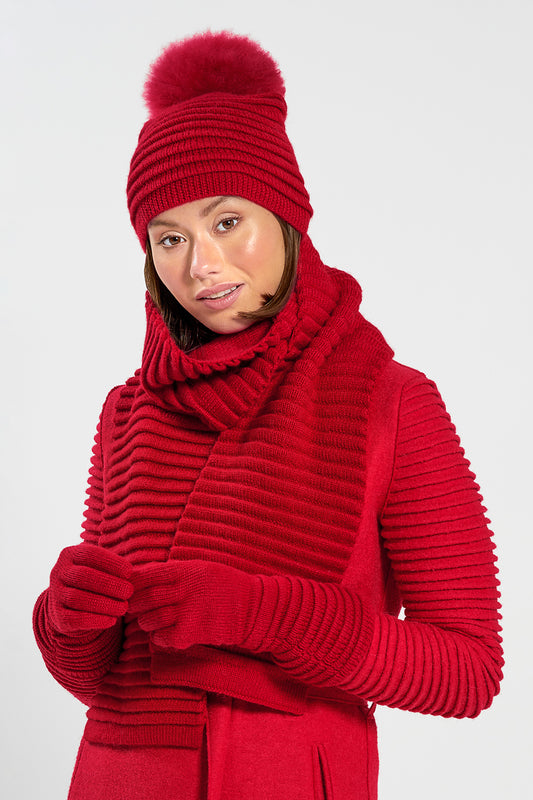 Sentaler Adult Ribbed Hat With Oversized Fur Pompon featured in Baby Alpaca and available in Red. Seen with scarf and gloves 2.