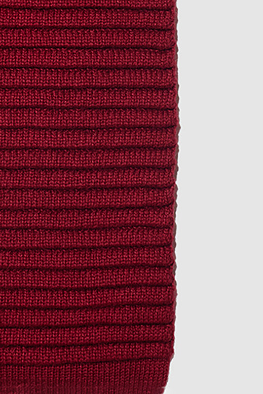 Sentaler Adult Ribbed Scarf featured in Baby Alpaca and available in Garnet Red. Seen as off figure up close.