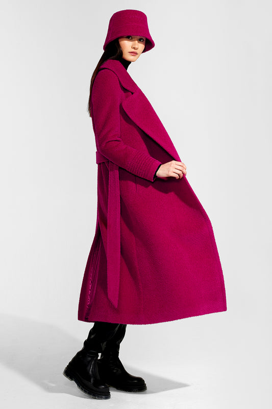 Sentaler Bouclé Alpaca Long Notched Collar Wrap Coat and Bouclé Alpaca Bucket Hat featured in Bouclé Alpaca and available in Orchid Flower. Seen from side open on model.