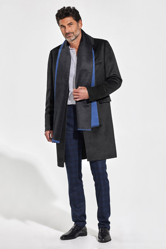 Sentaler Double Sided Suri Alpaca Scarf featured in Suri Alpaca and available in Black-Blue. Seen from front on model.