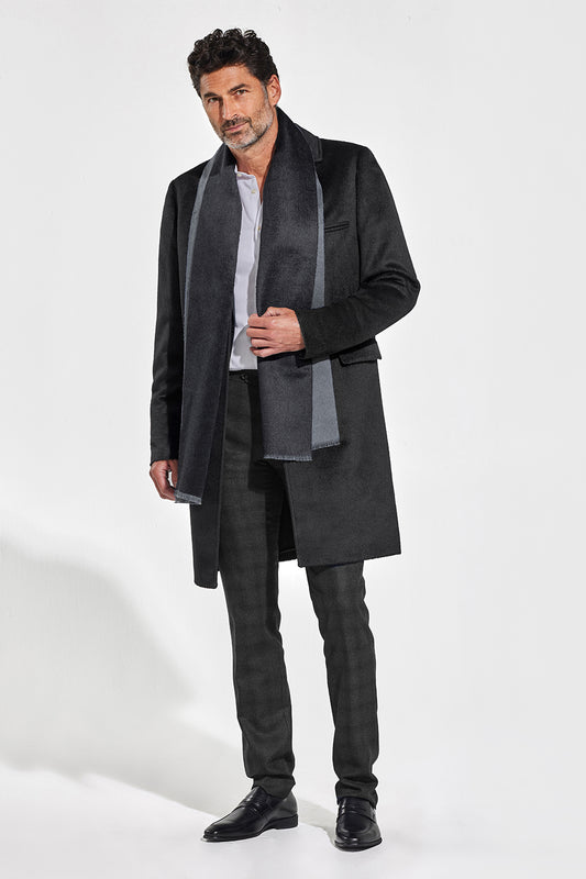 Sentaler Double Sided Suri Alpaca Scarf featured in Suri Alpaca and available in Black-Charcoal. Seen from front on model.