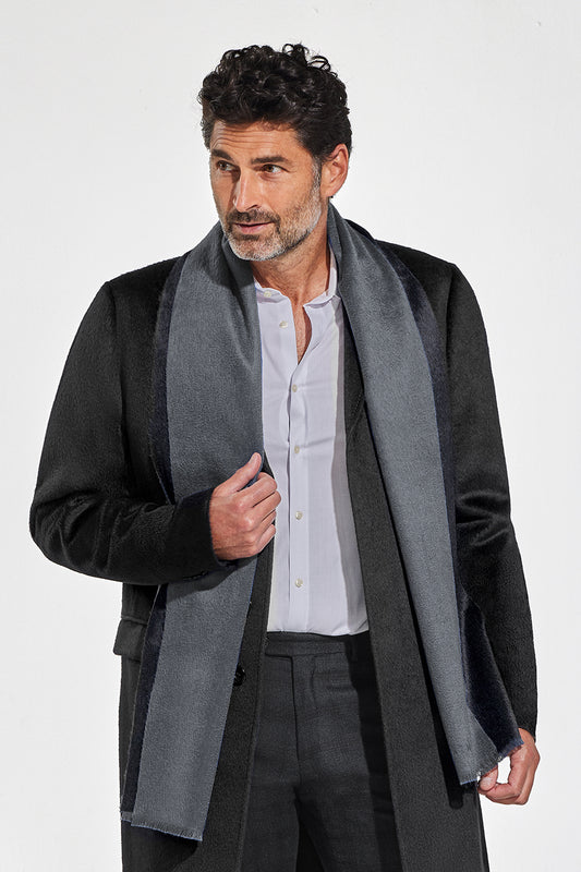 Sentaler Double Sided Suri Alpaca Scarf featured in Suri Alpaca and available in Black-Charcoal. Seen from front close up on model.