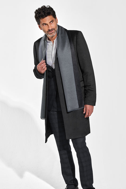 Sentaler Double Sided Suri Alpaca Scarf featured in Suri Alpaca and available in Black-Charcoal. Seen from front on model.