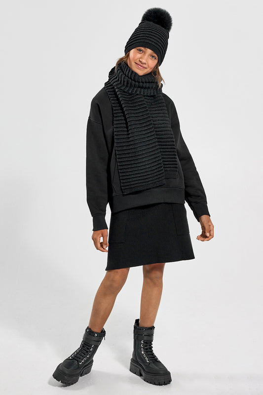 Sentaler Kids (6-14 Years) Ribbed Scarf and Ribbed Scarf featured in Baby Alpaca and available in Black. Seen from front on model.