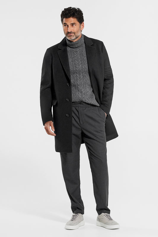 Sentaler Technical Baby Alpaca Notched Lapel Overcoat featured in Technical Baby Alpaca and available in Black. Seen from front open on model.