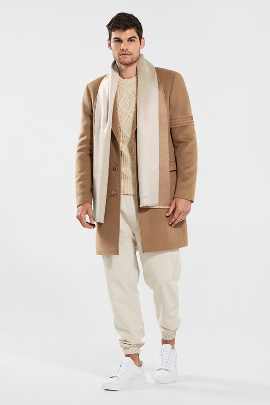 Sentaler Double Sided Suri Alpaca Scarf featured in Suri Alpaca and available in Dark Camel-Light Taupe. Seen from front on model.